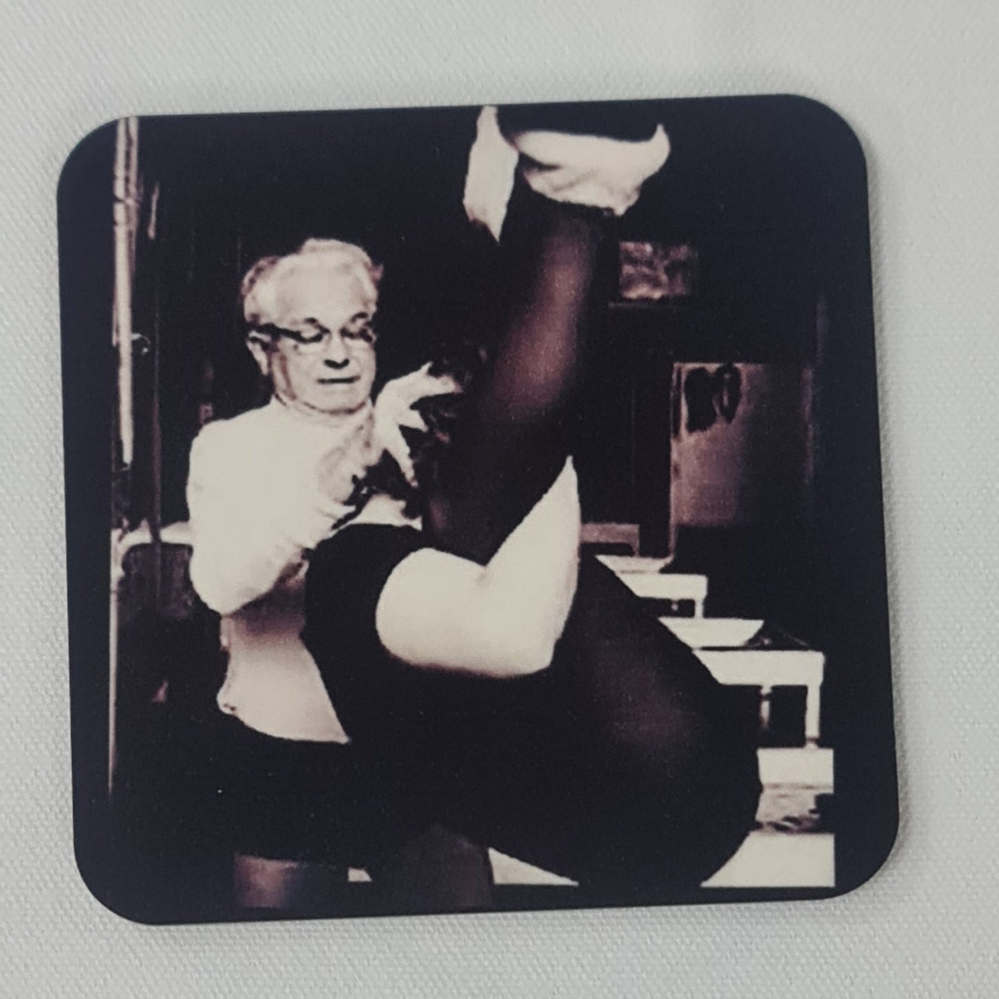 jospeh pilates teaching squirrel on the trapeze table. classic black and white