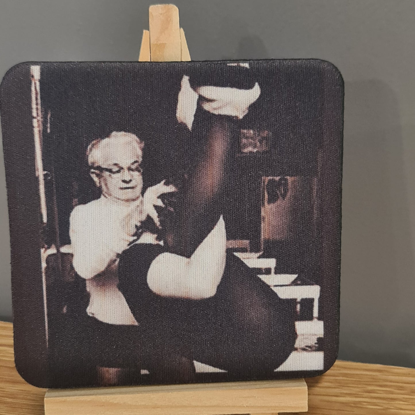 photo on square neoprene coaster - joseph pilates teaching squirrel - a pilates exercise on the trapeze table