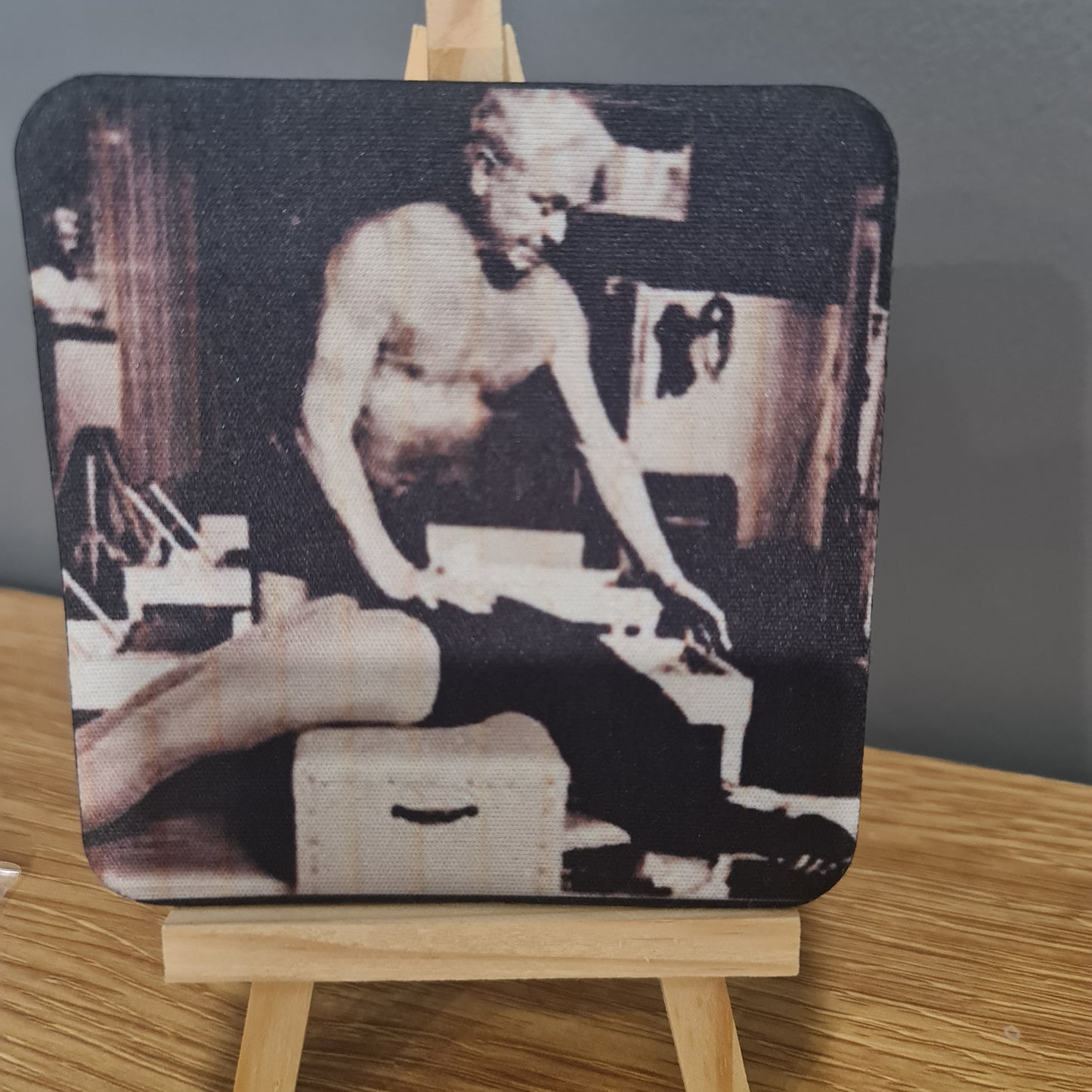 classic  photo on square neoprene coaster - joseph pilates teaching climb a tree exercise on the reformer box
